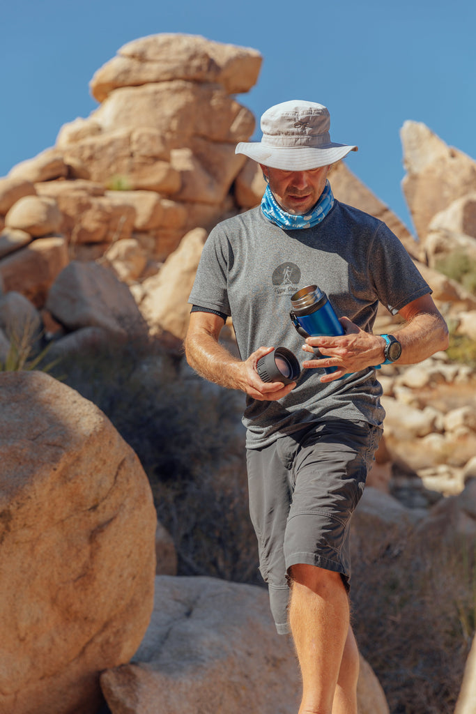 4AllFamily Australia Insulin Cooler - Picture showing diabetic traveler in the desert keeping insulin pens cool with 4AllFamily