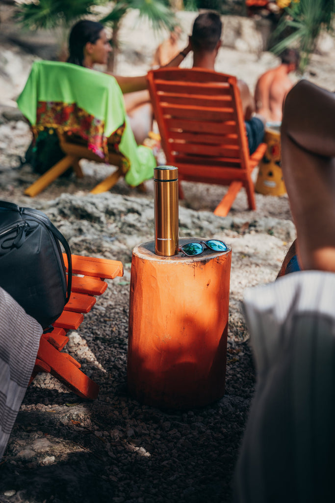 4AllFamily Australia  Insulin Travel Cooler - Nomad Model - Gold color option - Picture of campers with insulin on the beach 